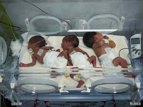 Babies are seen in an incubator at the preemie ward of a hospital in Rafah, Gaza Strip, Friday, March 8, 2024.
