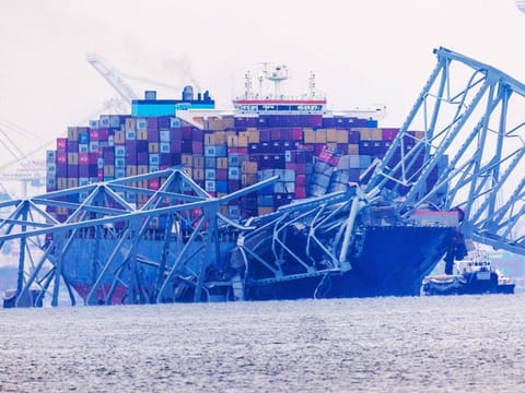 Cargo ship Dali sits in the water after running into and collapsing Baltimore's Francis Scott Key Bridge on March 27, 2024.