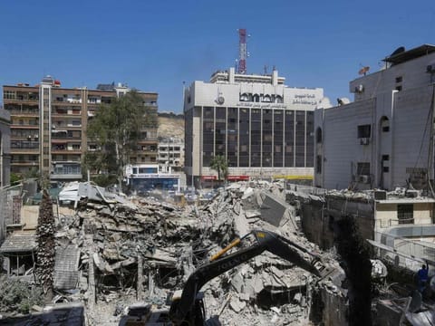 The rubble of a building annexed to the Iranian embassy is pictured a day after an air strike in Damascus on April 2, 2024.