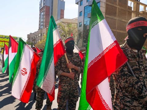 Iranian attend the funeral procession for seven Islamic Revolutionary Guard Corps members killed in a strike in Syria, which Iran blamed on Israel, in Tehran on April 5, 2024.