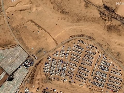 This handout satellite image courtesy of Maxar Technologies shows tent camps for displaced Palestinians in Rafah in the southern Gaza Strip on April 7, 2024.