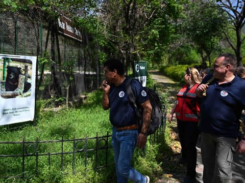 In this picture taken on April 5, 2024, Amir Khalil (left), veterinarian and director of the project development for Four Paws International, and Frank Goeritz (right), head veterinarian of Leibniz Institute for Zoo and Wildlife Research in Berlin, visit the Margallah Wildlife rescue centre, formerly a zoological park, in Islamabad.