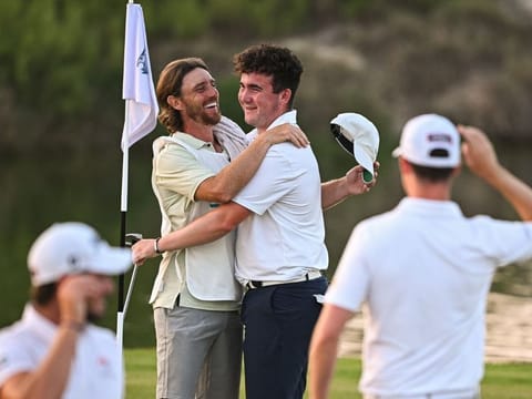 Oscar Craig and Tommy Fleetwood celebrate making the cut