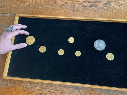 Seven coins dating back from the late 16th and 17th century, belonging to the Lars Emil Bruun's collection and have been acquired by the National Museum are pictured on May 16, 2024 he National Museum in Copenhagen.
