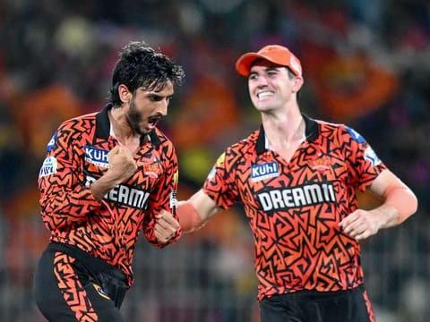 Sunrisers Hyderabad’s Shahbaz Ahmed (left) celebrates with captain Pat Cummins after taking a wicket during the Indian Premier League second qualifier cricket match in Chennai on May 24, 2024. Ahmed’s left-arm spin fetched three wickets, which broke the back of Rajasthan.