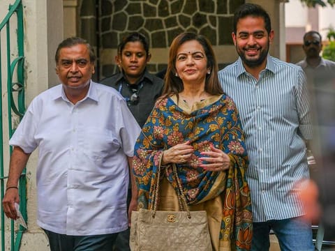 Mukesh Ambani, chairman and managing director of Reliance Industries Ltd., Nita Ambani, wife of Mukesh Ambani, Akash Ambani, a board member of Reliance Industries Ltd. and chairman of Reliance Jio Infocomm Ltd., left to right, arrive at a polling station during the fifth phase of voting for national elections in Mumbai, India, on Monday, May 20, 2024.