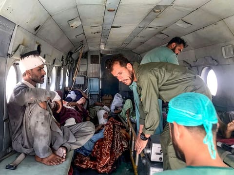 A Pakistani army helicopter transports injured victims after a bus accident in Basima town of Balochistan province on May 29, 2024.
