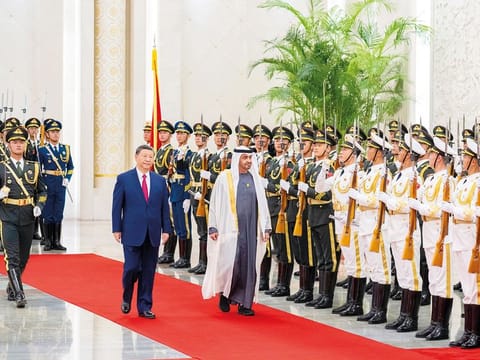 President His Highness Sheikh Mohamed Bin Zayed Al Nahyan and His Excellency Xi Jinping, President of China, inspect a guard of honour following the UAE President’s arrival at the Great Hall of the People in Beijing on Thursday. Both leaders discussed ways to enhance cooperation on the 40th anniversary of diplomatic ties.