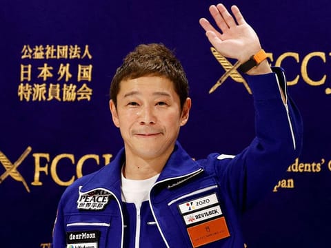 Japanese billionaire Yusaku Maezawa, who returned to Earth last month after a 12-day journey into space, attends a news conference after returning to Japan, at the Foreign Correspondents' Club of Japan, in Tokyo, Japan January 7, 2022.