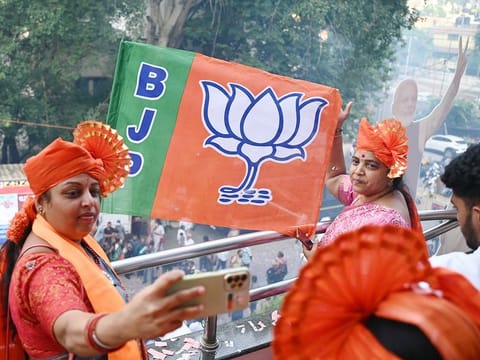 Supporters India's ruling BJP in Bengaluru on June 4, 2024