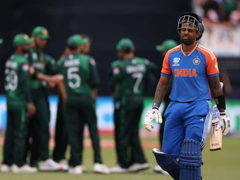 India's Suryakumar Yadav looks dejected as he walks off the pitch after being caught out by Pakistan's Mohammad Amir on Sunday.