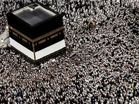 Muslim worshippers walk around the Kaaba, Islam's holiest shrine, at the Grand Mosque in Saudi Arabia's holy city of Mecca.