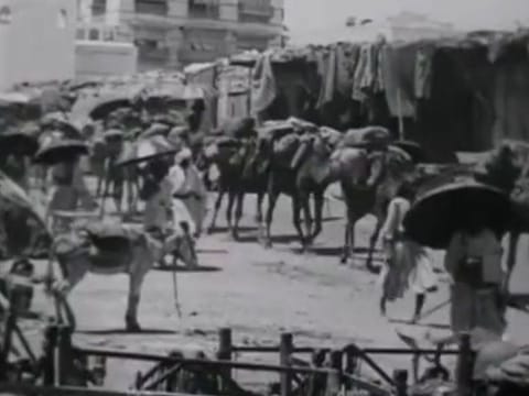 The video, one of the oldest depicting the pilgrimage, shows the faithful journeying to the holy city from Jeddah, where they first arrived by sea, before embarking on a days-long march on camels