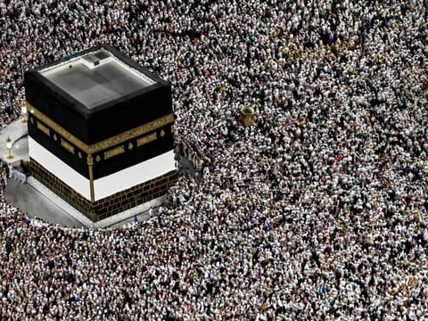 Pilgrims gather around the Kaaba, Islam's holiest shrine, at the Grand Mosque in Mecca on June 16, 2024, as they perform the farewell circumambulation or "tawaf", circling seven times around the large black cube, which is the focal point on the final day of the Hajj.