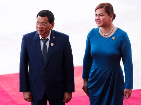 File: Former Philippines' President Rodrigo Duterte (L) and his daughter, Vice President Sara Duterte on April 10, 2018.
