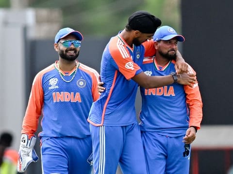 India’s Arshdeep Singh (centre) celebrates with teammate Kuldeep Yadav (right) during the ICC men's Twenty20 World Cup 2024 Super Eight cricket match against Australia in Gros Islet, Saint Lucia on June 24, 2024. Yadav played a pivotal role in the Indian win.
