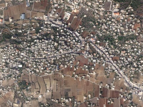 A satellite image shows part of the Lebanese village of Aita Al Shaab, near the border with Israel, Lebanon