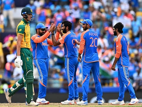 Jasprit Bumrah celebrates with teammates after dismissing Marco Jansen in the final on Saturday.