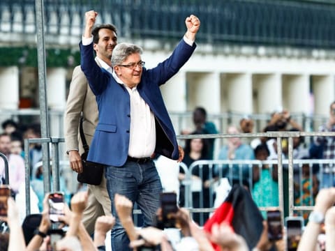 Jean-Luc Melenchon reacts during the election night of left-wing party La France Insoumise (LFI) following the first results of the second round of France's legislative election at La Rotonde Stalingrad in Paris on July 7, 2024.