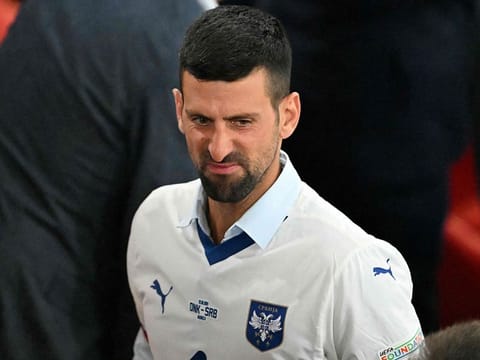 Serbia's tennis player Novak Djokovic reacts at the end of the UEFA Euro 2024 Group C football match between Denmark and Serbia at the Munich Football Arena in Munich on June 25, 2024.