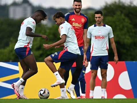 (From left) Spain's midfielder Nico Williams and forward Lamine Yamal along with teammates take part in a training session at the team's base camp in Donaueschingen, on Thursday.