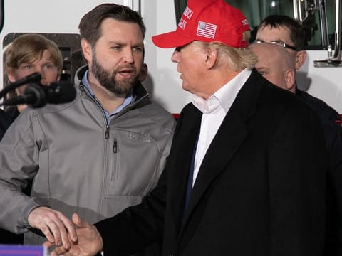 US Senator JD Vance shakes hands with former US President Donald Trump during an event in Ohio. Trump announces Ohio Senator J.D. Vance as running mate