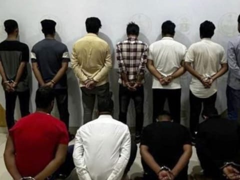Police handout photo of the suspects after their arrest.