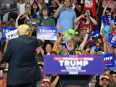 Former US President and 2024 presidential nominee Donald Trump gestures after speaking during a campaign rally with US Senator and vice presidential nominee J.D. Vance at Van Andel Arena in Grand Rapids, Michigan, on July 20, 2024.