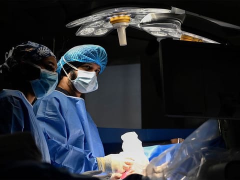 Dr Mandeep Singh performing the in-utero surgery.