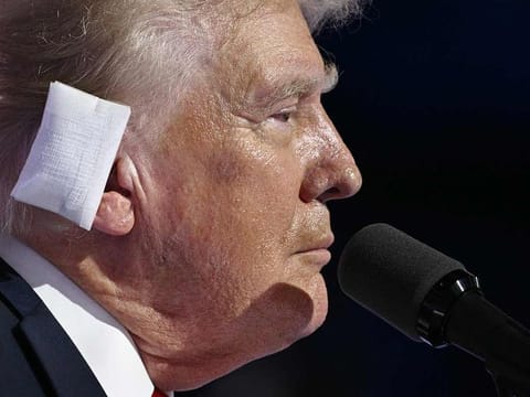 File photo: US former President and Republican presidential candidate Donald Trump, a bandage on his ear after he was injured during an assassination attempt, speaks onstage during the last day of the Republican National Convention at the Fiserv Forum in Milwaukee, Wisconsin, on July 18, 2024.