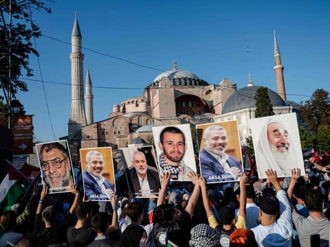 Pro-Palestinian demonstrators take part in a rally to condemn the assassination of Hamas leader Ismail Haniyeh, at Hagia Sophia Square in Istanbul, on August 3, 2024.
