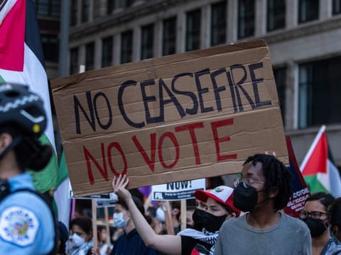 Pro-Palestine protesters march ahead of the Democratic National Convention on August 18, 2024 in Chicago, Illinois.