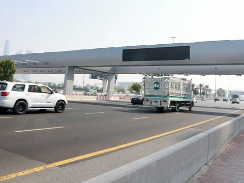 The finishing touches being put on Salik's new toll-gate in Business Bay on Al Khail Road. This and the one in Al Safa South will open in November.
