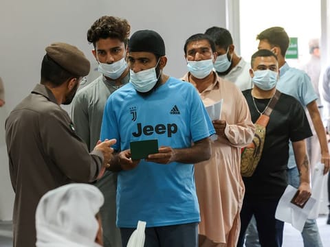File photo of amnesty seekers queuing up at a GDRFA Dubai counter in Al Awir on the second day of grace period, on September 2