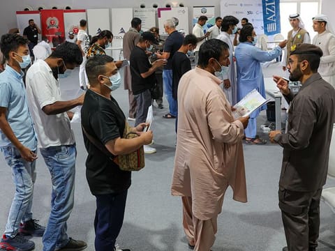 File photo of amnesty applicants queuing up at a GDRFA Dubai counter in Al Awir Centre on the second day of the two-month grace period for violators, on September 2