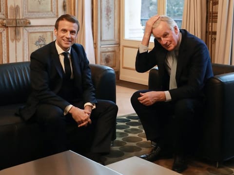 French president Emmanuel Macron with Michel Barnier in a file photo.