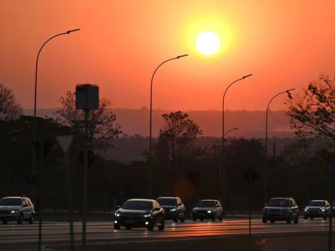 The sun sets in Brasilia, Brazil, amid smoke from forest fires in the northern and central western states, on September 9, 2024.