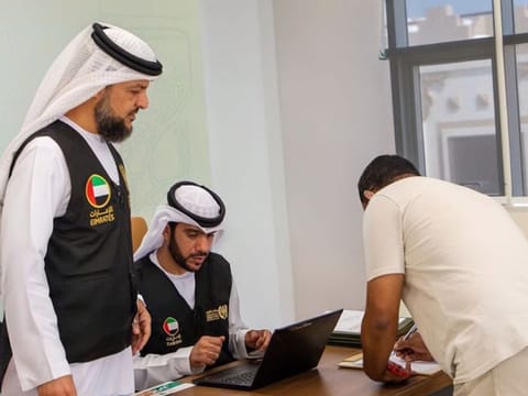 An amnesty seeker being guided about the procedures
