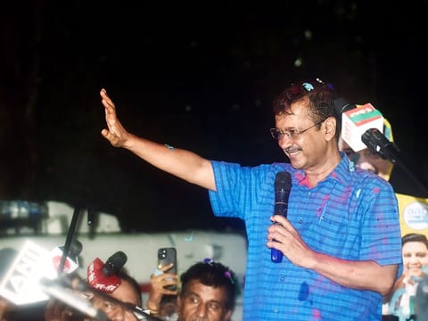 Arvind Kejriwal greets the supporters as he arrives at his residence after being released from Tihar Jail