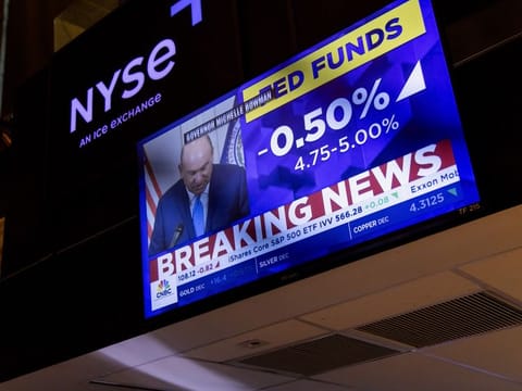 A television station broadcasts the Federal Reserve's interest-rate cut on the floor of the New York Stock Exchange (NYSE) in New York, US, on Wednesday, Sept. 18, 2024. The Federal Reserve lowered its benchmark interest rate by a half percentage point Wednesday, in an aggressive start to a policy shift aimed at bolstering the US labor market.