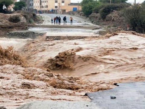 Regional authorities in Tata province said heavy rainstorms late Friday led to "exceptional" floods that caused houses to collapse and swept away the bus.