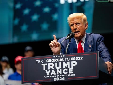 Republican presidential nominee, former US President Donald Trump speaks at a campaign rally at the Johnny Mercer Theatre on September 24, 2024 in Savannah, Georgia.