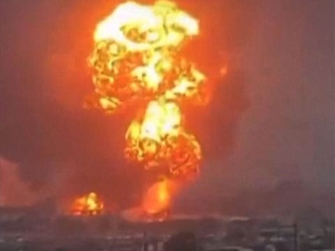 An image grab taken from a UGC video posted on social media on September 29, 2024, shows smoke billowing above Yemen's rebel-held Hodeida port city following Israeli strikes.