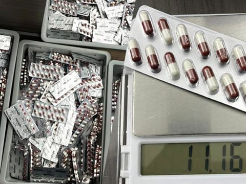 Customs officers became suspicious of packages and when they checked, the found the hidden tablets inside the lights