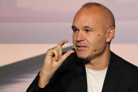 Spanish footballer Andres Iniesta gestures as he announces his retirement during an event in Barcelona on Tuesday.