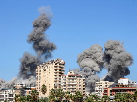 Smoke plumes erupt following an Israeli air strike on a neighbourhood of Lebanon's southern city of Tyre.