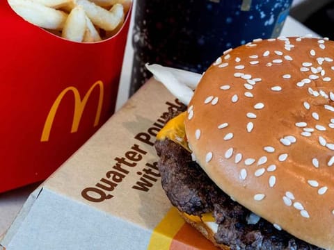 A quarter pounder with cheese, fries, and a drink arranged at a McDonald's restaurant in El Sobrante, California, US, on Wednesday, Oct. 23, 2024.
