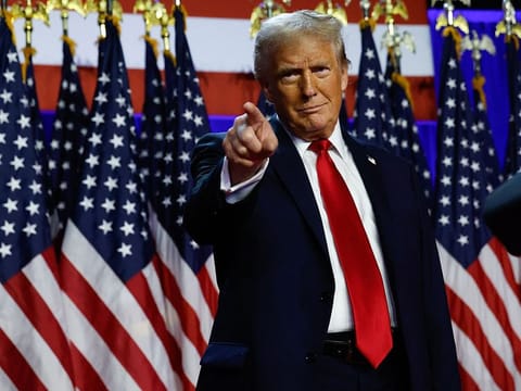 Former US President Donald Trump arrives to speak during an election night event at the Palm Beach Convention Centre on November 06, 2024 in West Palm Beach, Florida.