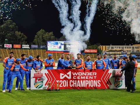 India players hold the trophy as they celebrate winning the T20 series following the fourth T20 international match against South Africa at Wanderers stadium in Johannesburg on November 15, 2024.