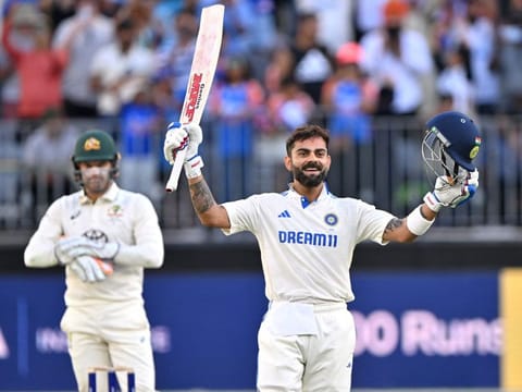 Indias Virat Kohli celebrates reaching his century during day three of the first Test cricket match against Australia at Optus Stadium in Perth on Sunday.
